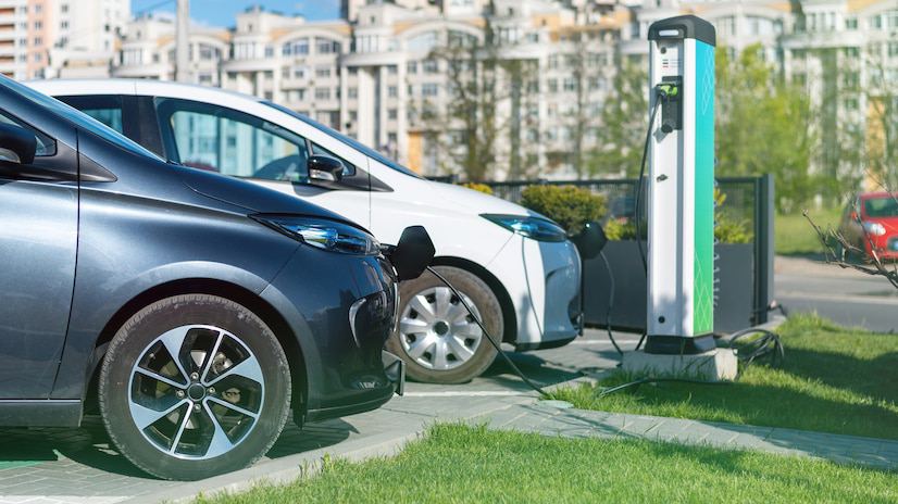 two-charging-electric-cars-charge-station-city_126